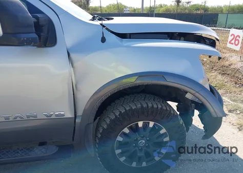 2018 Nissan Titan Pro-4X из США, поврежденный, VIN 1N6AA1E51JN551695